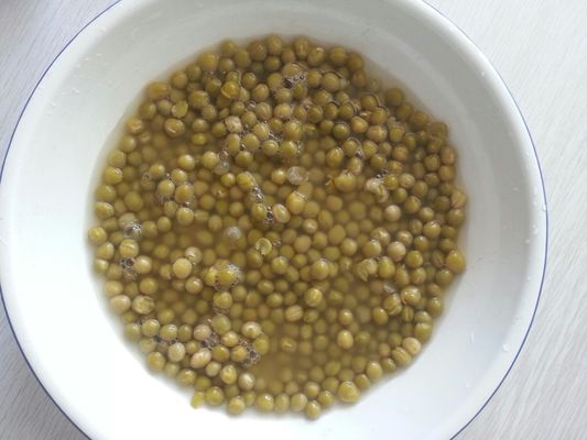 Le couvercle ouvert 425g de pois verts en conserve répond aux réglementations de sécurité alimentaire